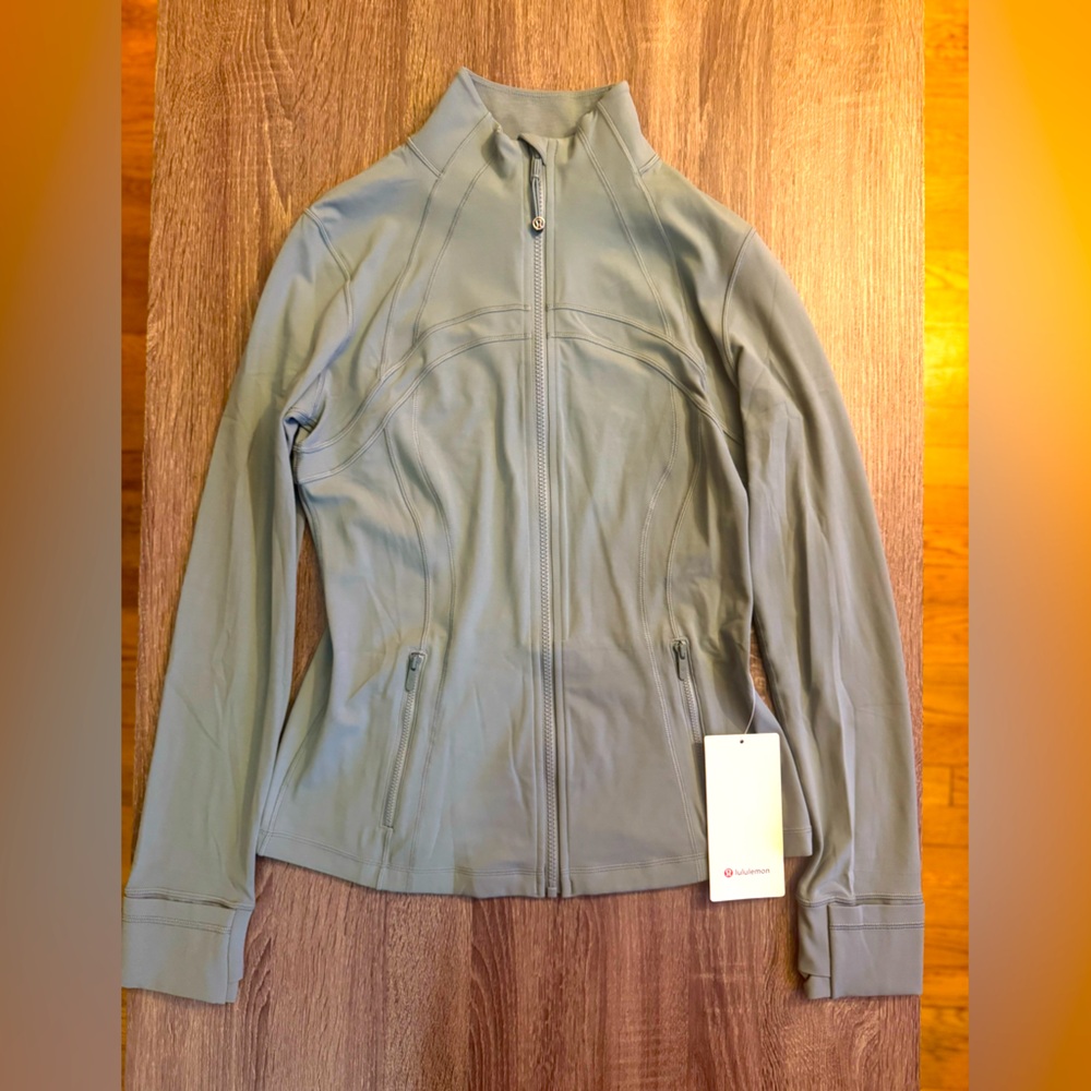 New Lululemon Nulu Define jacket. Crater Blue. Size 10. Light green tone.